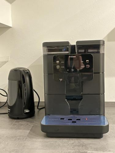 Wasserkocher und Saeco Kaffeevollautomat